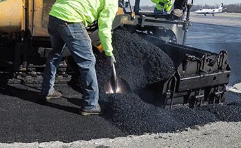 Asphalt being poured to be